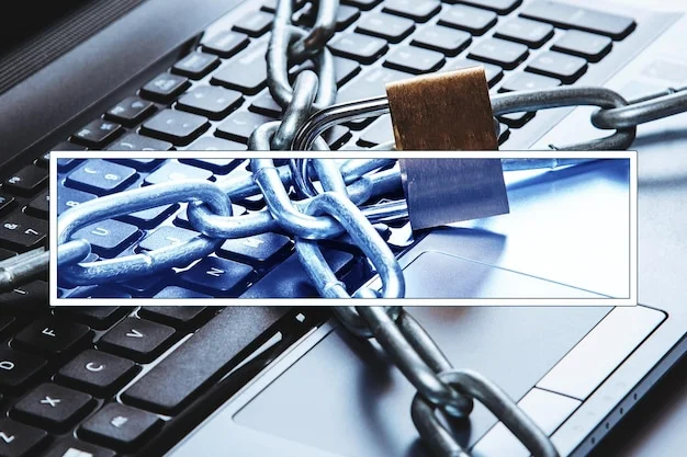 Padlock and chains securing a laptop keyboard, representing computer and internet security, virus removal, and